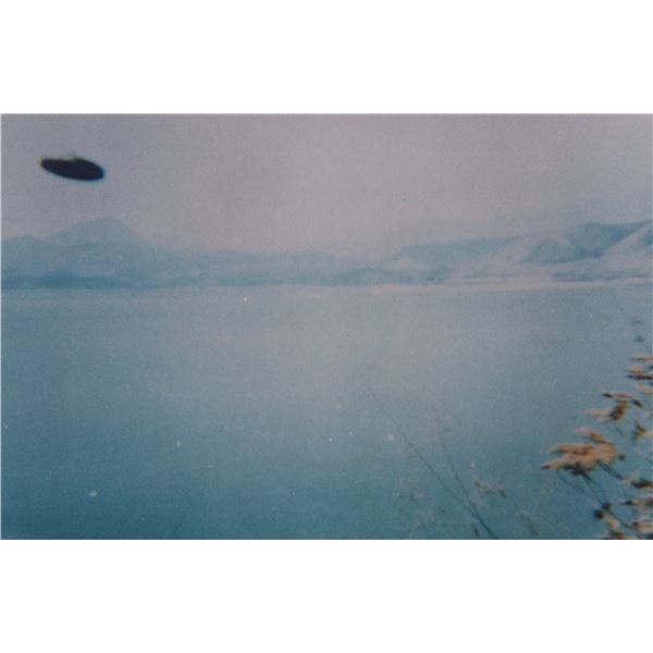Photograph: UFO Over Lake - Zitacuaro Michoacan Mexico, Oct. 1994 - Taken by Arturo Garcia