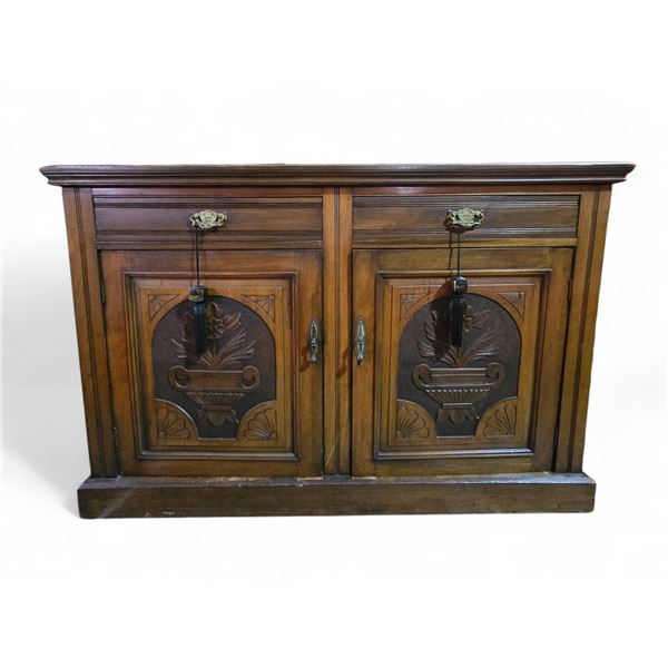 Antique Sideboard with Carved Door Panels - 18" x 52" x 35" tall - There are drapes inside the sideb