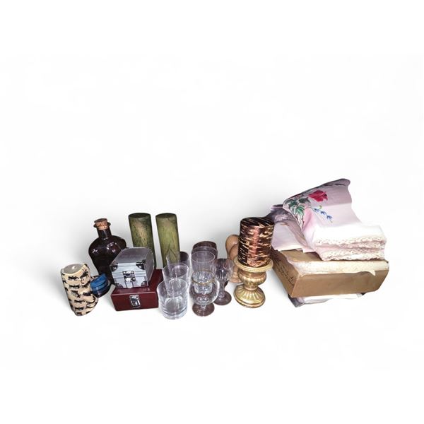 Shelf of Table Linens, Candles, Boxes and Other House Hold Goods