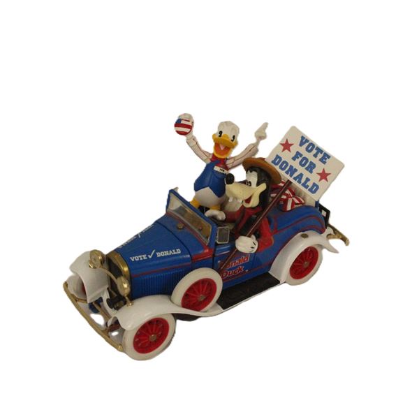 A Metal Donald and Goofy In Roadster.