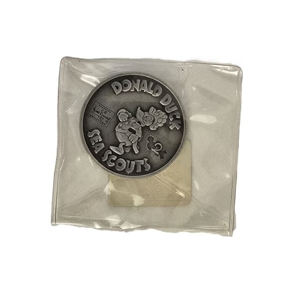 A WDCC Donald Duck Coin.