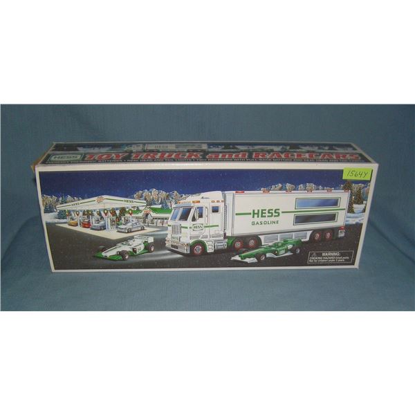 Hess toy trucks and race cars with original box