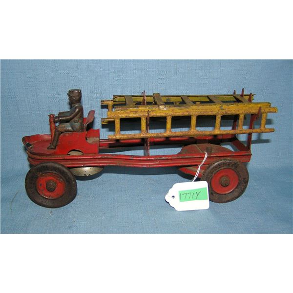 Early all tin fire ladder truck