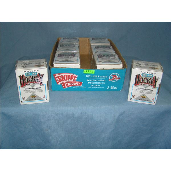 Box full of Upper Deck hockey high number hockey card sets