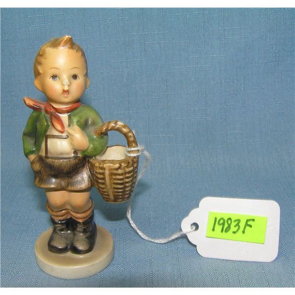 Boy with basket piano baby