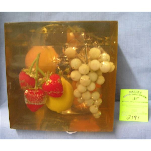 Large fruit decorated Lucite paperweight