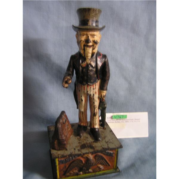 Original Uncle Sam cast iron mechanical bank