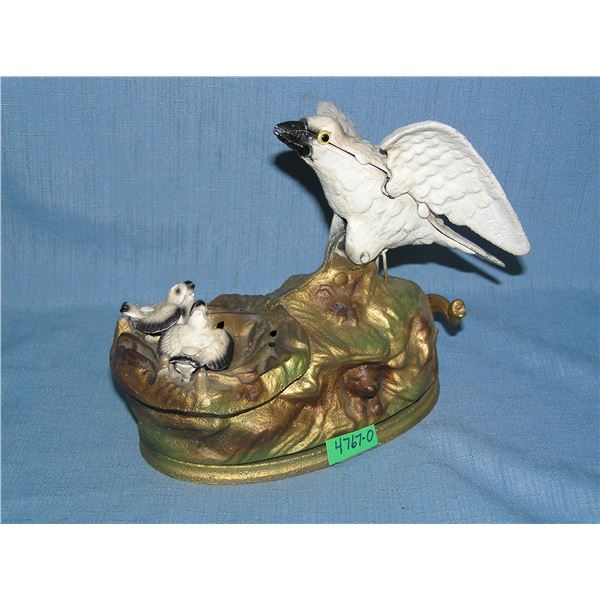 Cast iron eagle and eaglets mechanical bank