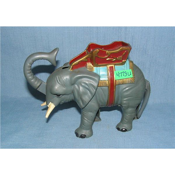 Hard plastic elephant mechanical bank dated 1975