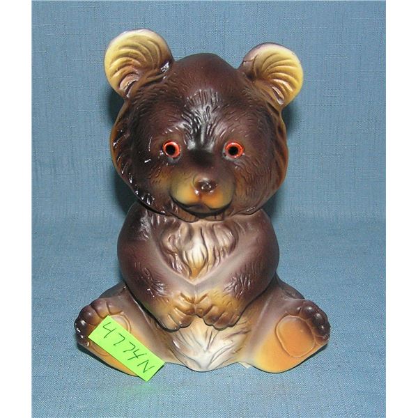 Composition seated bear bank