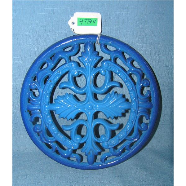 Enamel over cast iron trivet 8 inches round