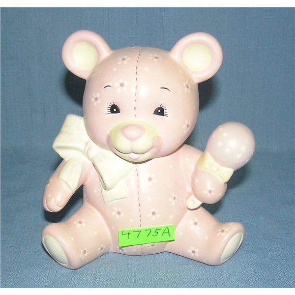 Seated bear bank with ribbon and rattle by Enesco