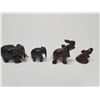 Image 2 : Collection of four hand-carved wooden elephant figurines