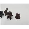 Image 5 : Collection of four hand-carved wooden elephant figurines