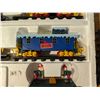 Image 5 : Box of 'Christmas Magic" Trains, Train Carts, Rails. and Etc.