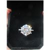 Image 2 : 5.00 CT GRA CERTIFIED ROUND BRILLIANT CUT MOISSANITE STONE VVS D COLOR SET IN CENTER WITH 14 ROUND B