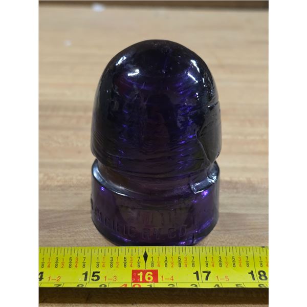 Dark purple glass insulator- by Canadian pacific