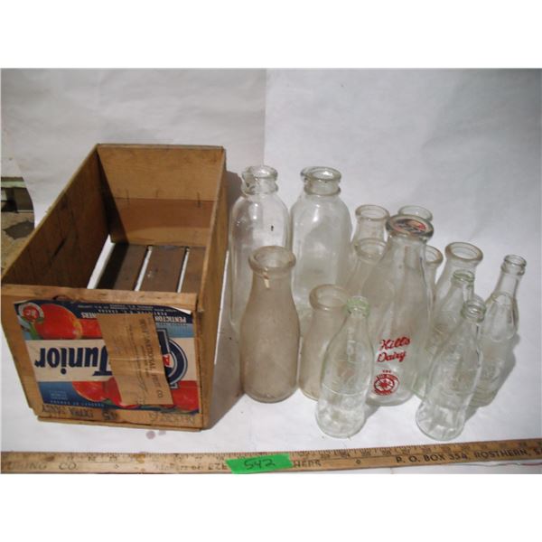 Vintage apple crate with milk and pop bottles
