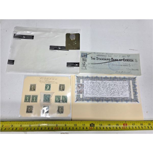 Stamps, coin and check