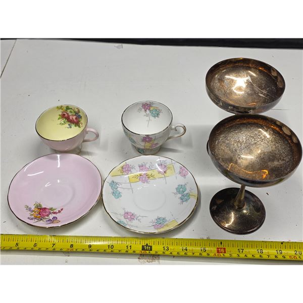 2 china cups and plates with 2 gobblets