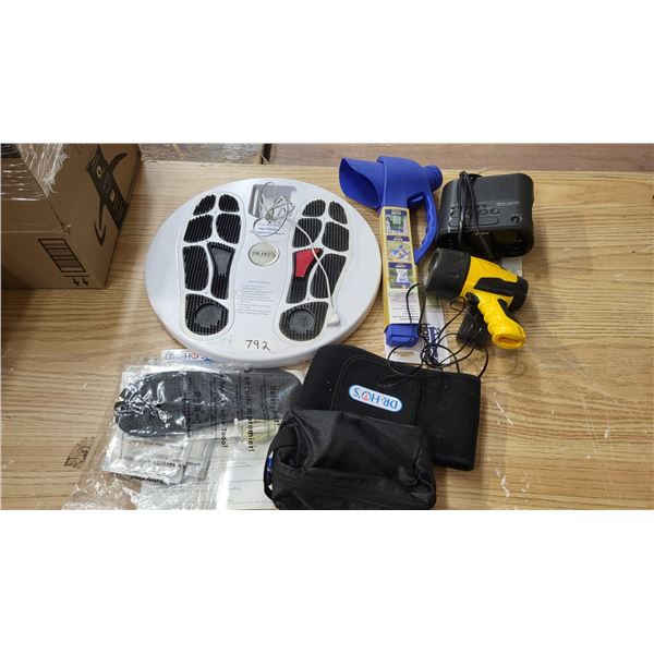 Dr. Ho's pain therapy, clock, and other items