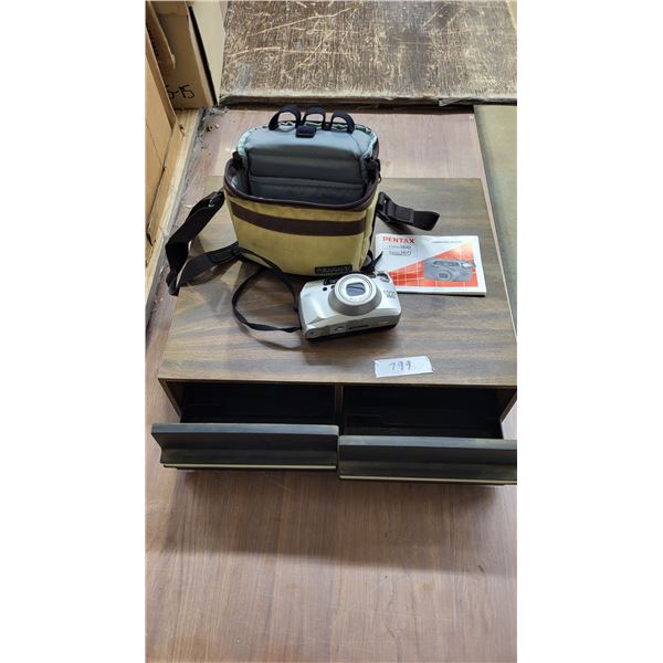 Pentax camera with case and manual, vhs case