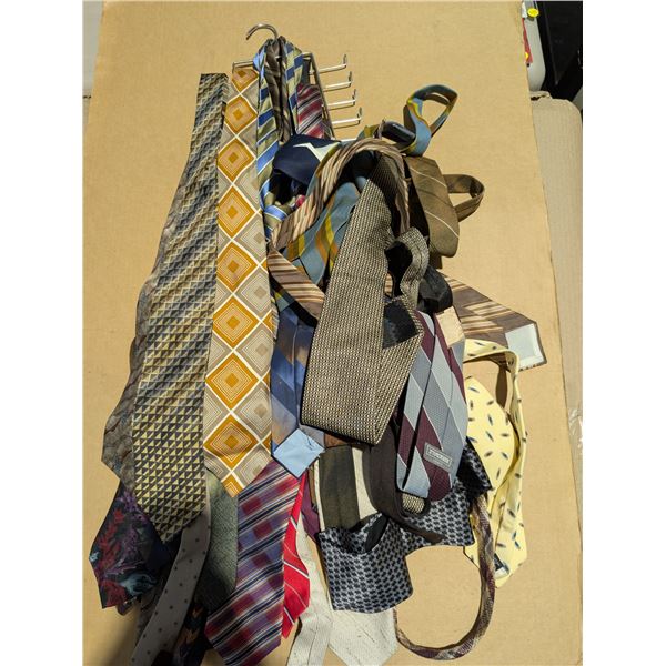 Variety of ties with a tie hanger. All very good condition.