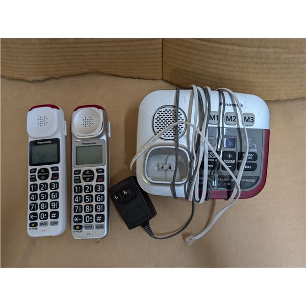 Telephone set with extra phone. Works well. Has an answering machine.