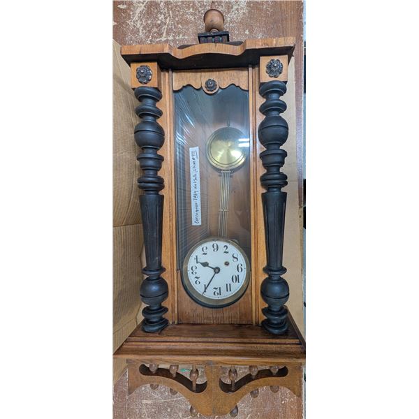 Large wooden wall clock with brass pendulum. Chimes. Works well. Brought a day later on Oct 7. There