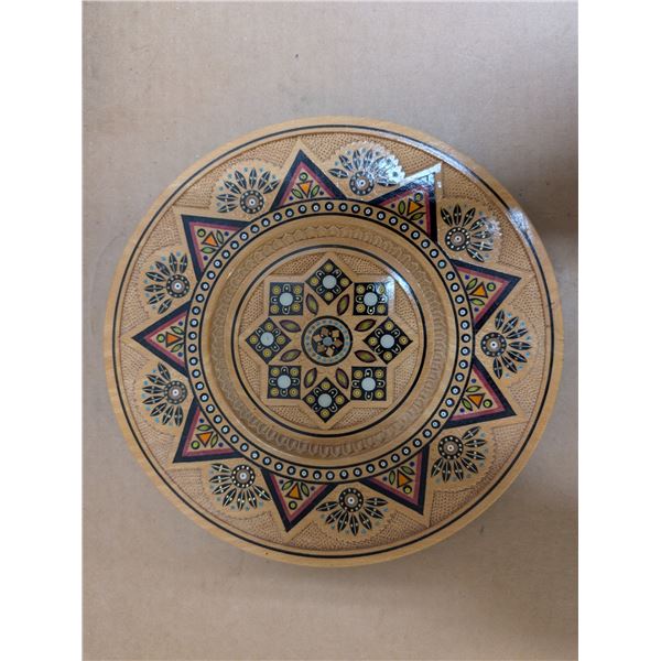 Wooden dish carved in Ukraine. Has attached hook for hanging on wall.