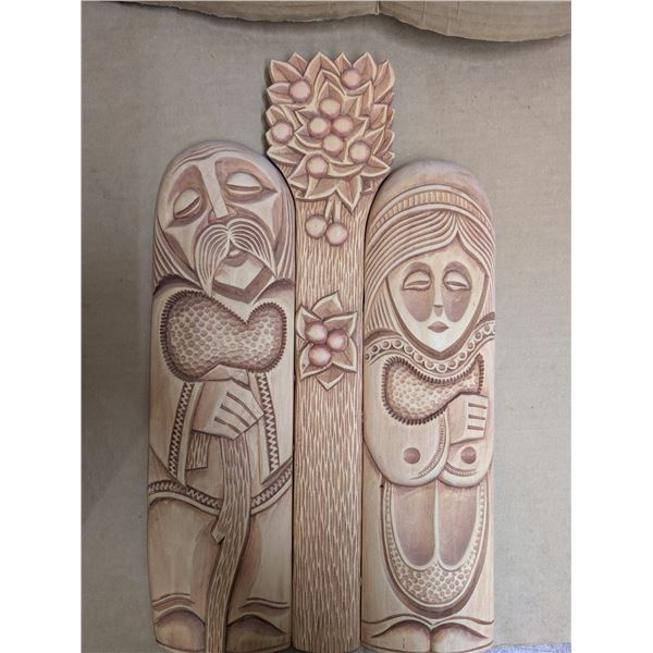 Wood carving (3 sections glued together) from Ukraine of a man and a woman. Carved by V. Shevchuk, 1