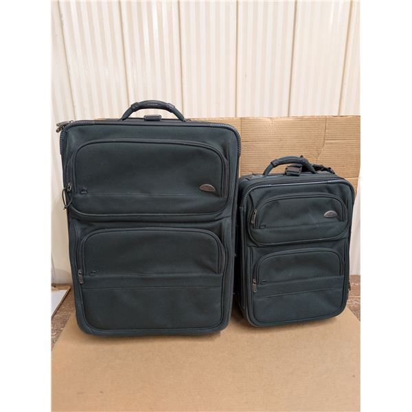 2-Piece green luggage set (cargo and take on). Towing strap included to tow both with one hand. All 