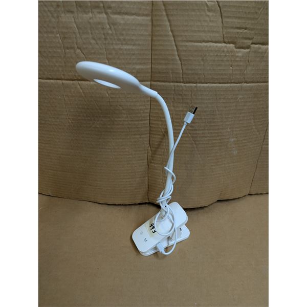 Clip on touch lamp with charger. Works.