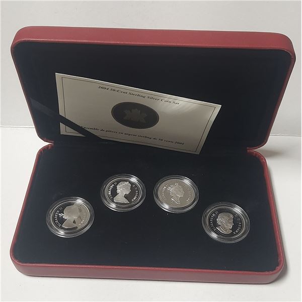 50-Cent 2004 Sterling Silver Coin set showing four different portraits of Queen Elizabeth II.