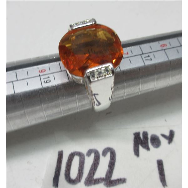 Silver Colored Ring With Orange Stone