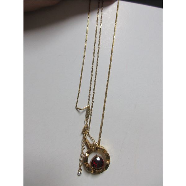 2 gold colored necklaces, 12"-8" long , 1 stamped 10k