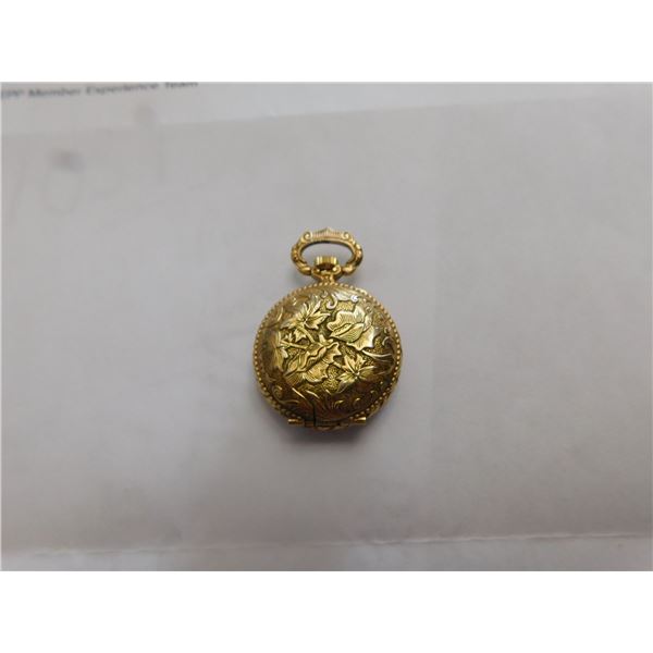 1093.  LADIES ORIS WINDUP LOCKET WATCH