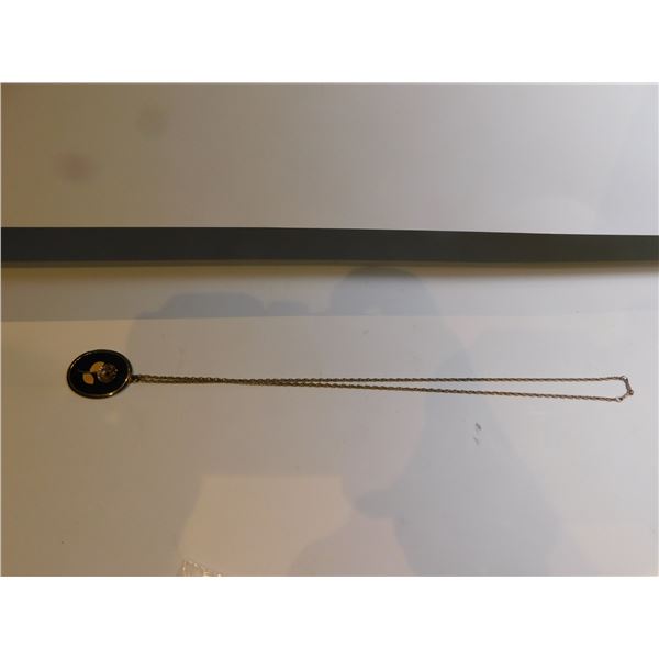 1132.  GOLDTONE FLOWER PENDANT ON STERLING CHAIN