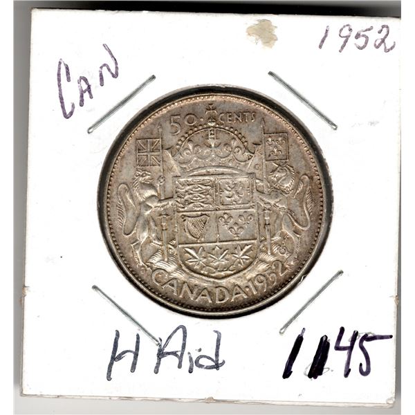 1145.  1952 FIFTY CENT HEARING AID VARIETY