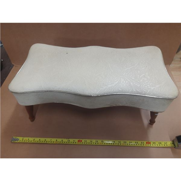 Vintage upholstered ottoman or footstool.