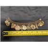 Image 2 : 1345:  14 kt gold bracelet with 28 gold charms, mixture of 12 kt, 14 kt and unknown charms. Weight: 