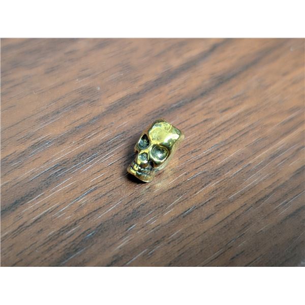 gold guilded silver skull