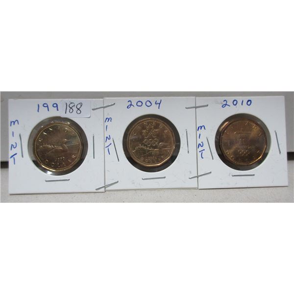 3 various canadian loonies, 1990, 2004, 2010 mint