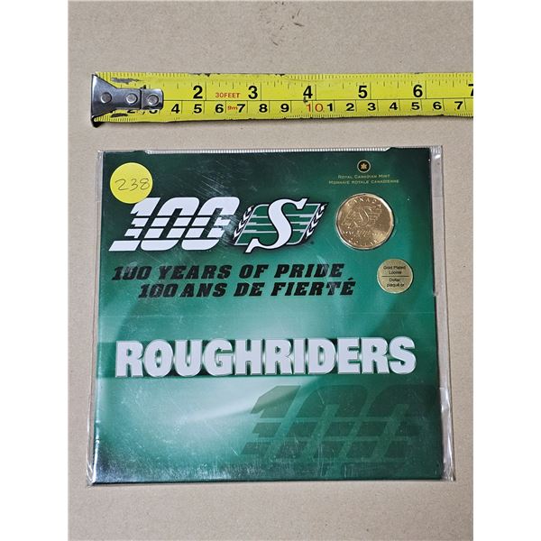 2010 Gold Plated One Dollar Coin "Sask Roughriders: 100 Years of Pride" Uncirculated. Royal Canadian