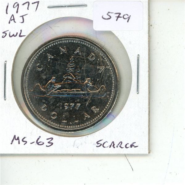 1977 Attached Jewels and Short Water Lines in front of canoe Nickel Dollar. MS-63. Scarce