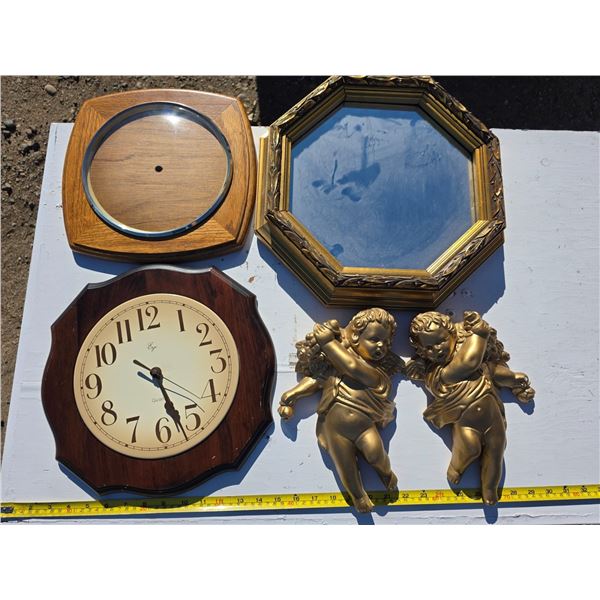 Chalkware figures, clock and mirror