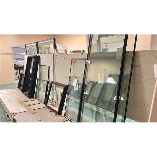 GROUP LOT OF ASST SEALED GLASS UNITS AND SKYLIGHT FRAMES APPROX 9 GLASS PIECES AND 6 PVC FRAMES