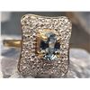 Image 1 : Light Blue Sapphire and Wide Diamond Frame Ring