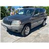 Image 1 : JEEP GD CHEROKEE 1999 SALV T/DONATION