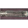 Image 1 : SMALL ANTIQUE BOTTLE - ELIXIR OF OPIUM - EMBOSSED 